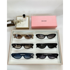 Miu miu Sunglasses